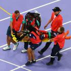 Ethiopia's Lamecha Girma was taken to hospital after falling heavily in the steeplechase. Photo:...