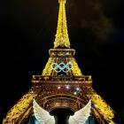 The Eiffel Tower, adorned with the Olympics Rings, illuminated during the opening ceremony of the...
