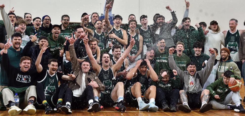 City Rise Bombers players and supporters celebrate victory in the Dunedin men’s club basketball...
